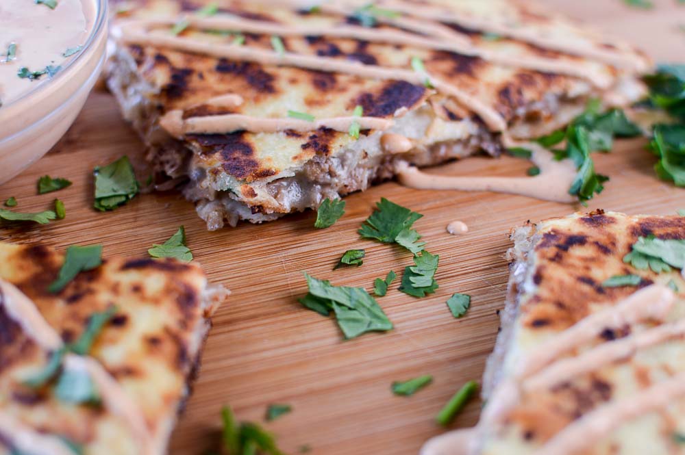 Closeup of the amazingly delicious Kalua Pig Pulled Pork Quesadilla with Chipotle Cream Sauce