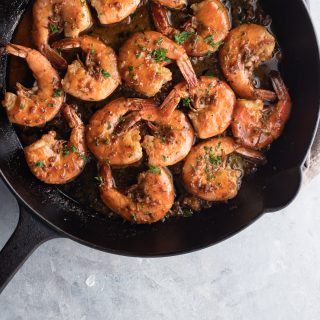 Overhead on the delicious New Orleans BBQ Shrimp in a pan ready to be served