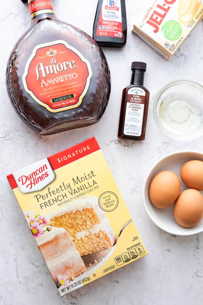 Amaretto Bundt Cake ingredients showcased on a big white countertop