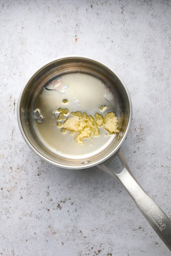 small pan with garlic and olive oil
