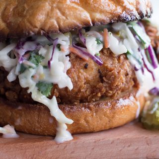 Closeup of the delicious Buttermilk Fried Chicken Sandwich with Cilantro Jalapeño Coleslaw