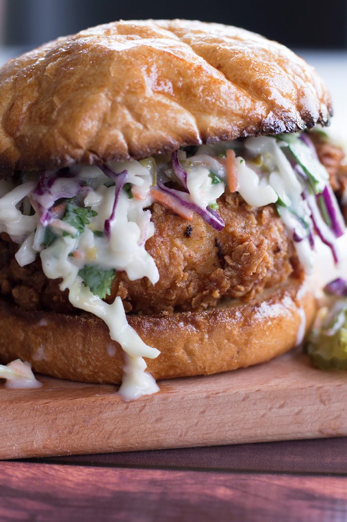 Fried chicken sandwich on biscuit with coleslaw