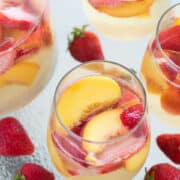 This easy Sparkling Peach and Strawberry Sangria was a hit at our cook out this weekend!