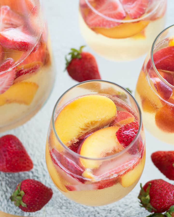 This easy Sparkling Peach and Strawberry Sangria was a hit at our cook out this weekend!