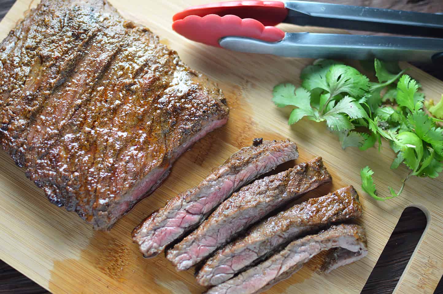 Overhead on the juicy Citrus Marinated Skirt Steaks with a bit of parsley on the side