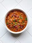 Bowl of chili on white counter top