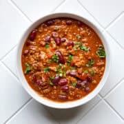Bowl of chili on white counter top