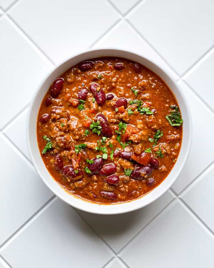 Bowl of chili on white counter top