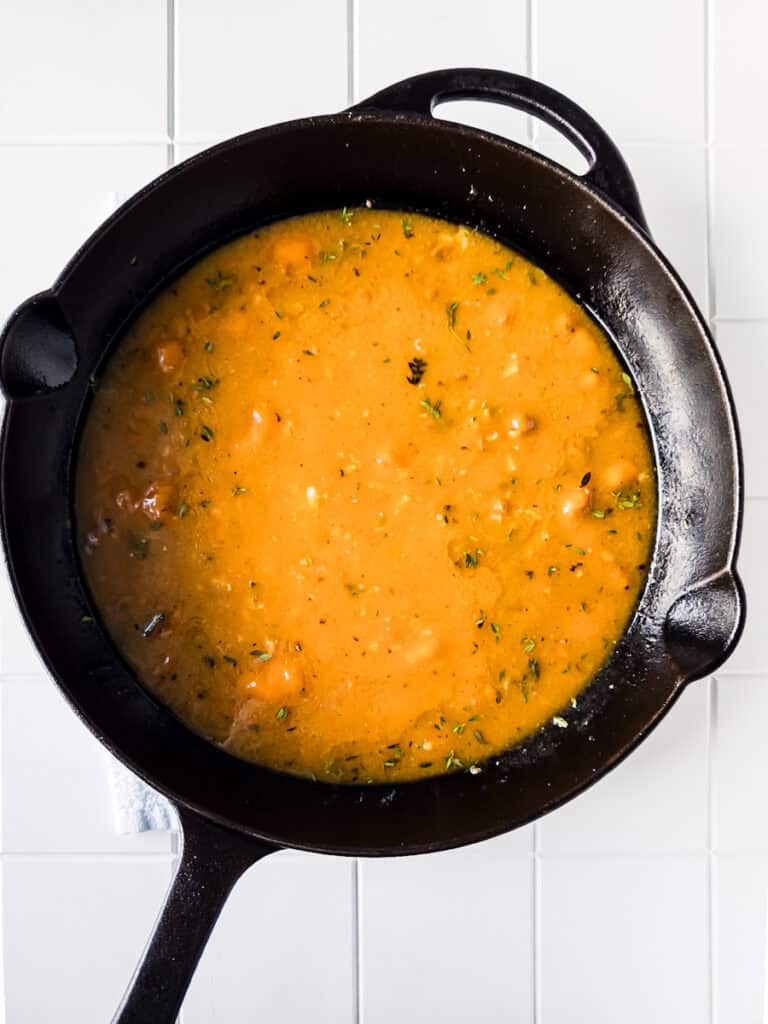 Golden mushroom sauce in pan