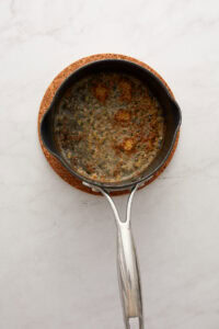 Honey chipotle sauce ingredients in small saucepan