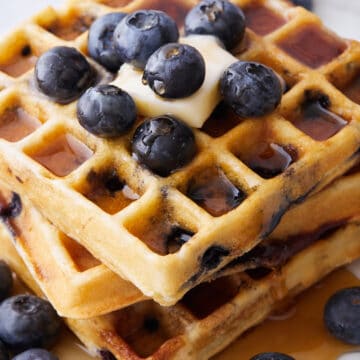 Closeup of the delicious Blueberry Ricotta Waffles served to the table