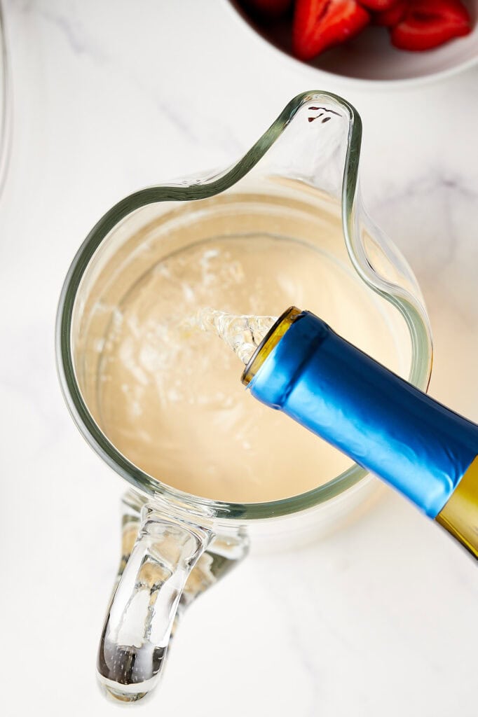 Pouring Wine Into Pitcher 