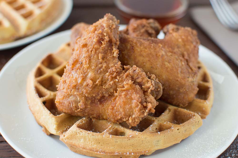 Serving Buttermilk Fried Chicken and Buttermilk Peach Waffles on a big white plate