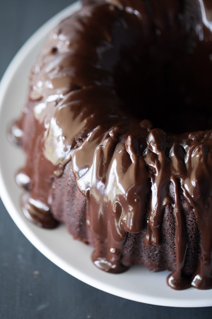 Side view of the Chocolate running down from the extrenely delicious looking Super Moist Chocolate Cake