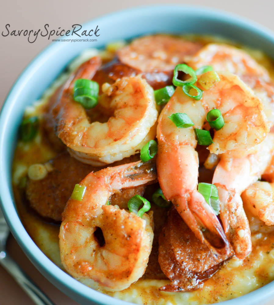 Gigantic shrimp on top of the cajun shrimp and grits looking absolutely fantastic