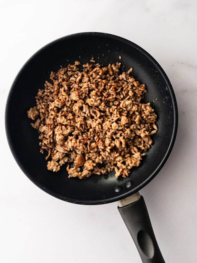 Cooked Italian ground sausage in pan