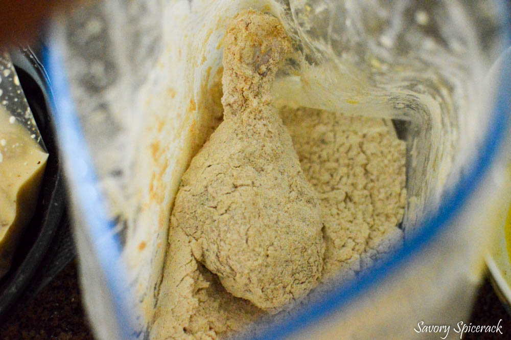 Adding a little baking powder to the flour mix and chicken inside the bag