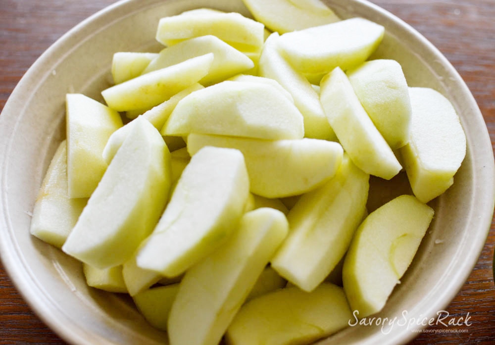 Cut apples in a big bowl looking extra fresh