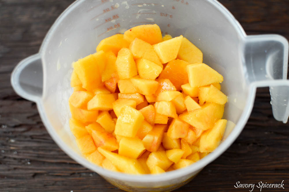 Diced up peaches in a vessel