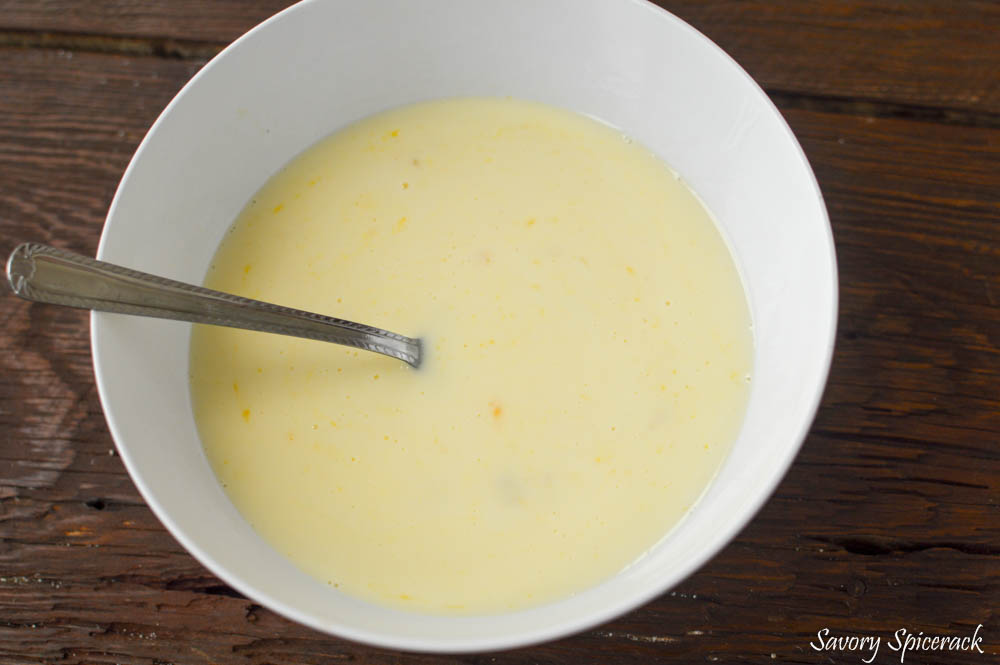 Mixing all wet ingredients together in a big white bowl