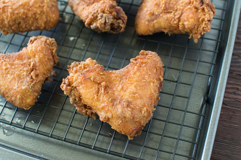 Overhead on the delicious pieces of Buttermilk Fried Chicken ready for serving