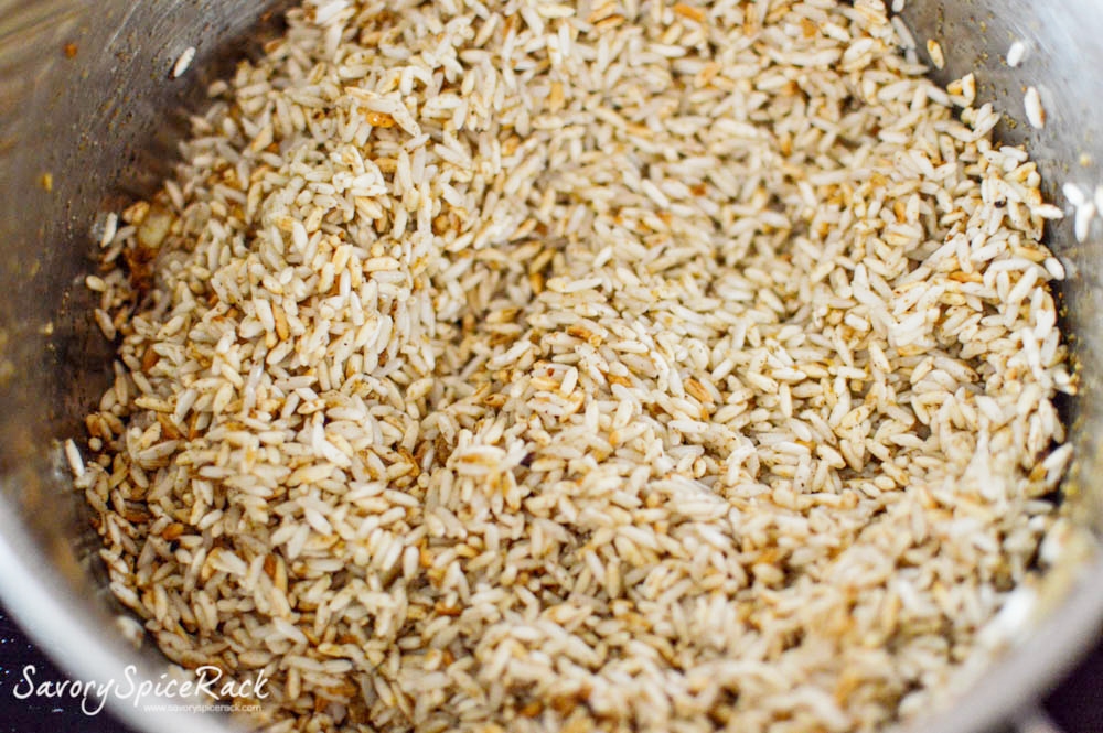 Browning your rice in a big pan